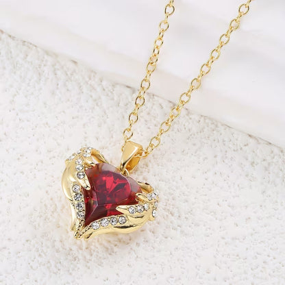 Collar Abrazo de Ángel con corazón de rubí | Oro