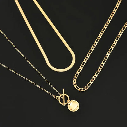 Collar superpuesto de monedas texturizadas Savira | Oro