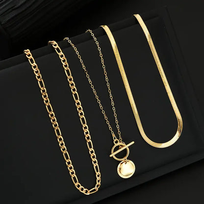 Collar superpuesto de monedas texturizadas Savira | Oro