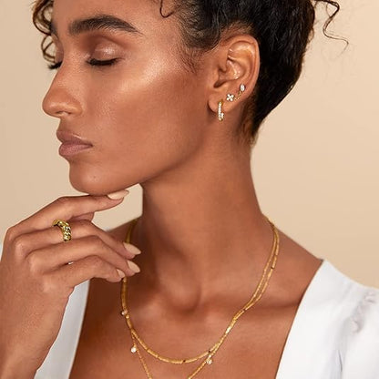 Aretes de botón corte pera | Oro