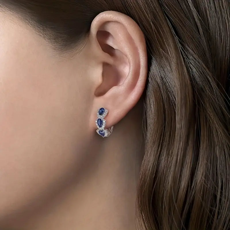 Aretes con el escudo real de zafiro | Oro blanco