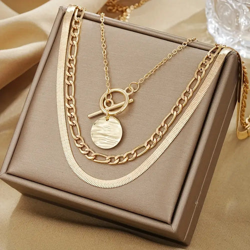 Collar superpuesto de monedas texturizadas Savira | Oro