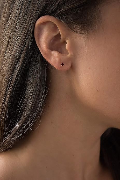 Aretes de botón redondos con rubíes | Oro