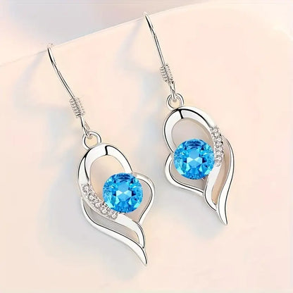 Aretes Eclipse Corazón | Oro blanco