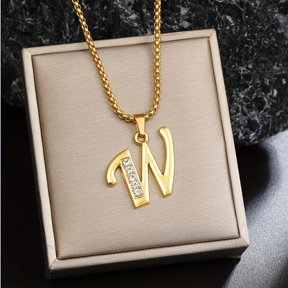 Collar con inicial y detalle de cristal | Oro
