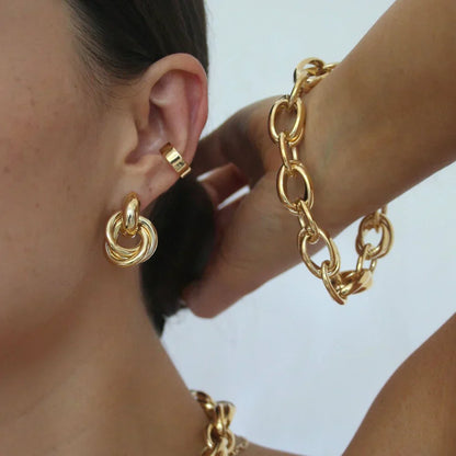 Aretes entrelazados llamativos | Oro