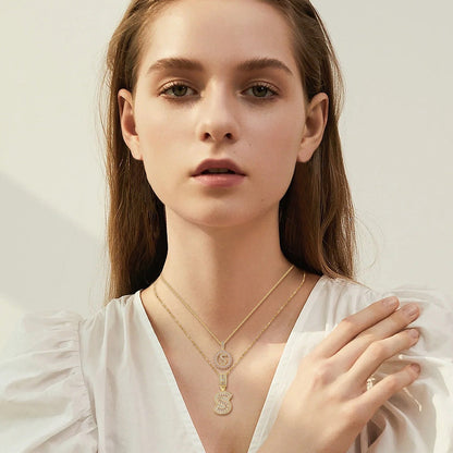Set de collar con inicial de letra pavé | Oro