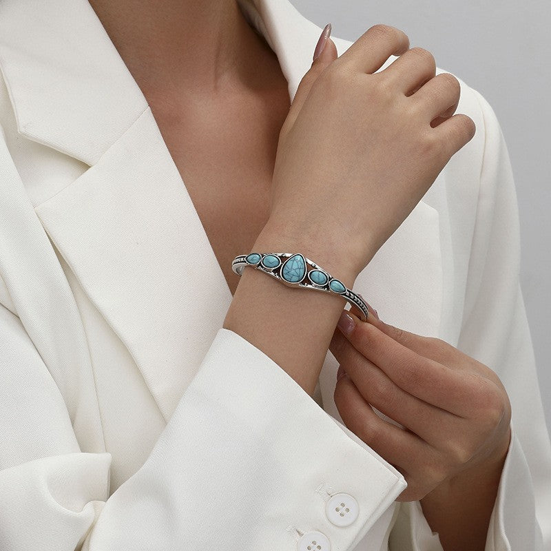 Brazalete Abierto con Gota Turquesa | Oro blanco