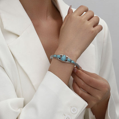Brazalete Abierto con Gota Turquesa | Oro blanco