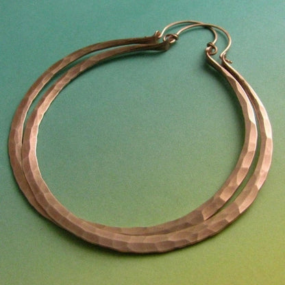 Aretes de cobre Twin Arc