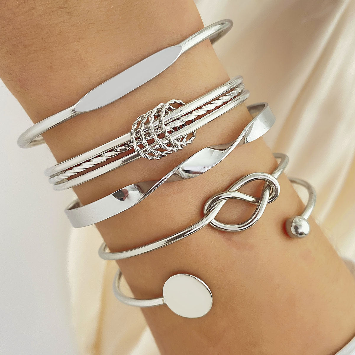 Juego de pulseras Elegancia Anudada | Oro blanco