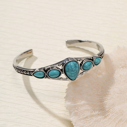 Brazalete Abierto con Gota Turquesa | Oro blanco