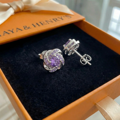 Aretes de nudo con cristal morado | Oro blanco