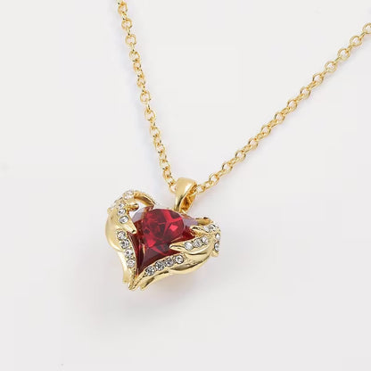 Collar Abrazo de Ángel con corazón de rubí | Oro