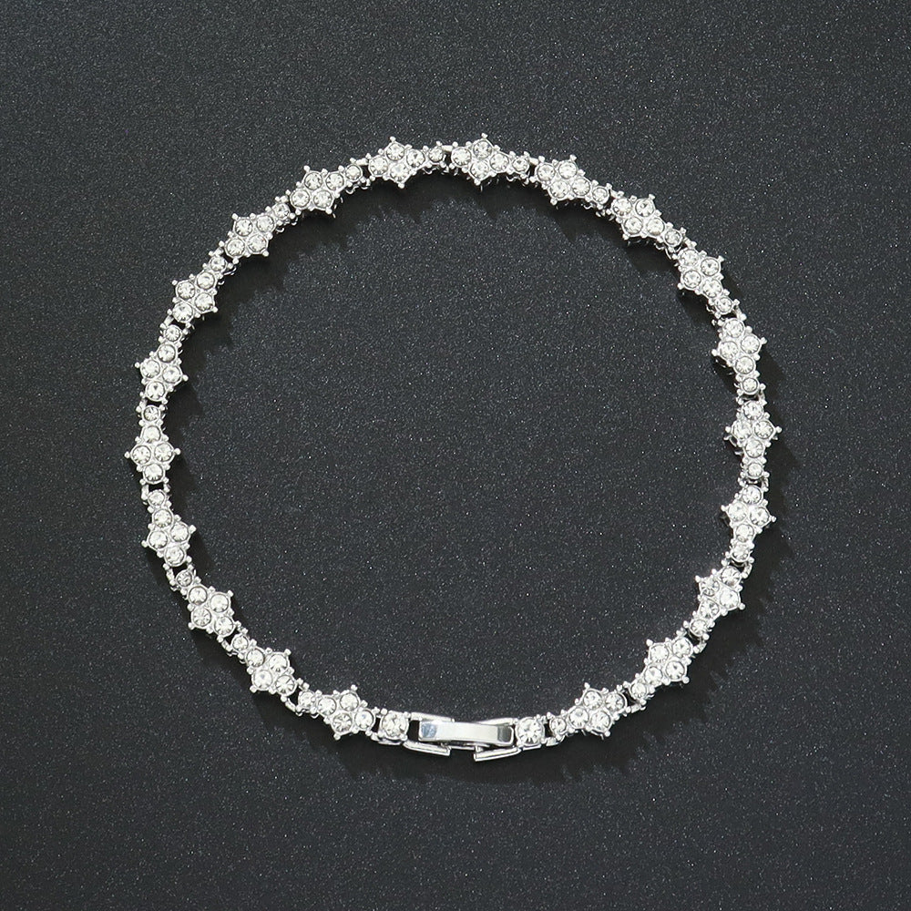 Pulsera de tenis clásica con racimos | Oro blanco